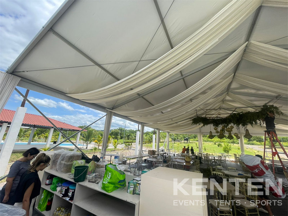 Party rental tent with rood curtains
